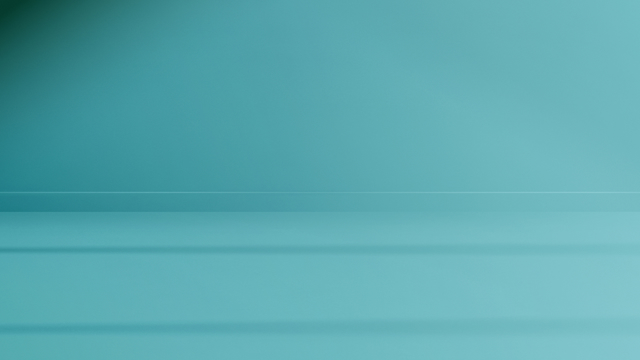 Blank wall in a light blue aqua colour