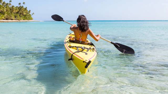 Instant Finance Travel Loan. Woman paddling a canoe