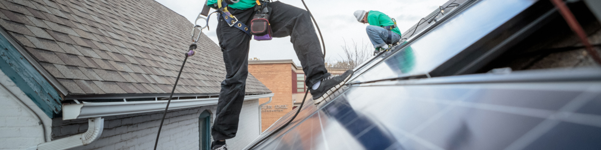 construction crew installing solar panels nz