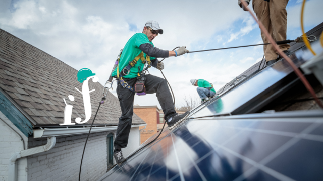 construction crew installing solar panels nz